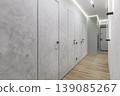 Modern Minimalist Hallway with Concealed Doors and Concrete Wall Texture 139085267