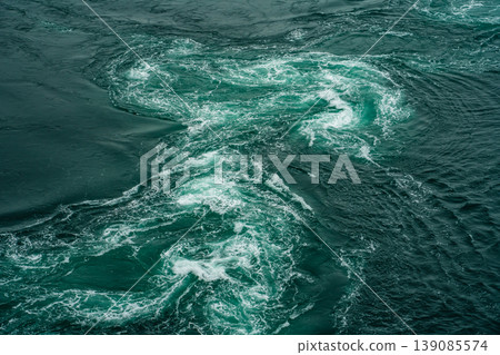Naruto whirlpools (spring tide) viewed from the Uzunomichi (Whirlpool Walkway) on the Ohnaruto Bridge [Naruto City, Tokushima Prefecture] 139085574