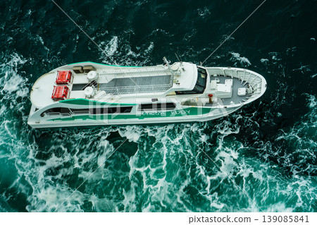 Naruto Bridge Promenade: Whirlpools (spring tide) and sightseeing boats from the Uzunomichi (Whirlpool Walkway) [Naruto City, Tokushima Prefecture] 139085841