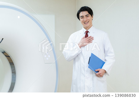 A radiologic technologist performing a CT scan at a hospital. Photo courtesy of Denpa Gakuen Educational Foundation, Tokyo Electronics College. A radiologic technologist performing a CT scan at a hospital. Photo courtesy of Denpa Gakuen Educational Foundation, Tokyo Electronics College. 139086830