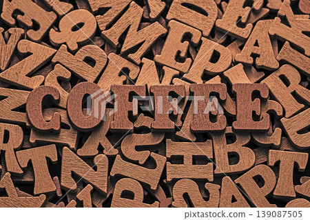 Inscription coffee on pile of old vintage wooden letters. Inscription coffee on pile of old vintage wooden letters. 139087505