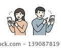 A man and a woman using their smartphones. 139087819