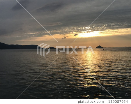 Sunset over Otsuchi Island and the Seto Inland Sea (horizontal view) Sunset over Otsuchi Island and the Seto Inland Sea (horizontal view) 139087954