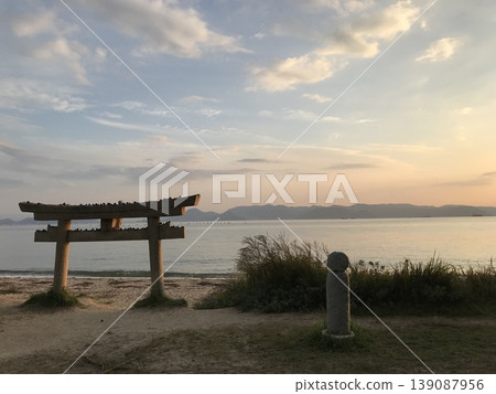 A torii gate and Jizo statues overlooking the Seto Inland Sea 139087956