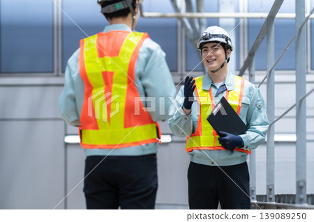 A male engineer performing building maintenance. Photo courtesy of Denpa Gakuen Tokyo Electronics College. A male engineer performing building maintenance. Photo courtesy of Denpa Gakuen Tokyo Electronics College. 139089250