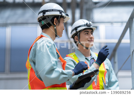 A male engineer performing building maintenance. Photo courtesy of Denpa Gakuen Tokyo Electronics College. A male engineer performing building maintenance. Photo courtesy of Denpa Gakuen Tokyo Electronics College. 139089256