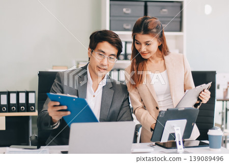 Group of business people and software developers working as a team in office Group of business people and software developers working as a team in office 139089496