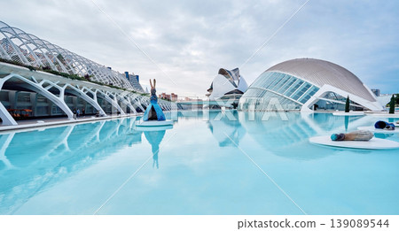 VALENCIA, SPAIN - OCTOBER 17, 2021: Panoramic view of the city of arts and sciences in Valencia created by architect Santiago Calatrava, overlooking Hemisferic and Queen Sofia Palace of the Arts 139089544
