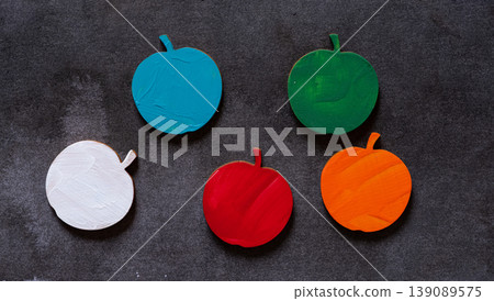 Colorful apples against a black background Colorful apples against a black background 139089575