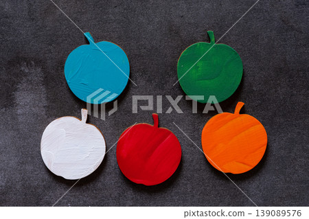 Colorful apples against a black background Colorful apples against a black background 139089576