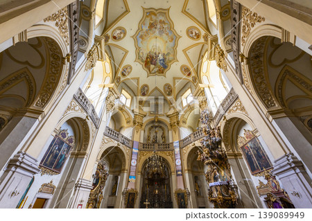 Ornate church interior showing Baroque architecture and ceiling frescoes Ornate church interior showing Baroque architecture and ceiling frescoes 139089949
