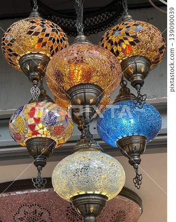 Colorful mosaic lamps hanging from ceiling, traditional Turkish decor Colorful mosaic lamps hanging from ceiling, traditional Turkish decor 139090039