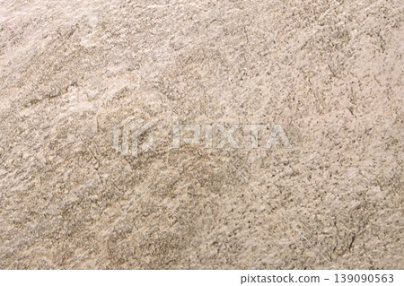 Textures of ancient stone tell stories of time in warm earthy tones 139090563