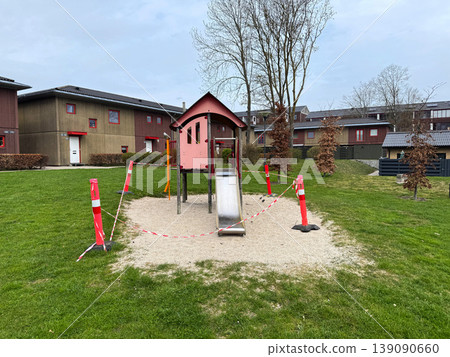 Closed playground with barrier tape and warning cones Closed playground with barrier tape and warning cones 139090660