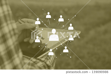 HR manager using digital tablet for human resources management and recruitment. Concept of networking, social connections, and professional hiring process with person icons interface 139090986