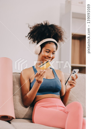 Women exercising in fitness studio yoga classes Women exercising in fitness studio yoga classes 139091089