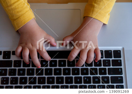Three year old navigating the internet, concept of early tech exposure 139091269