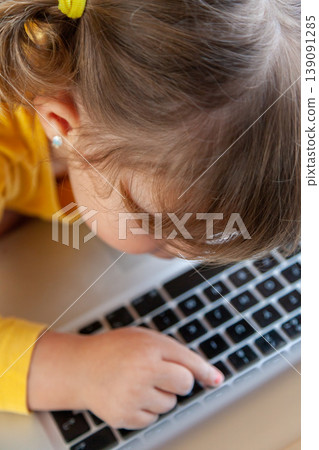 Toddler in a digital environment, representing both benefits and risks 139091285