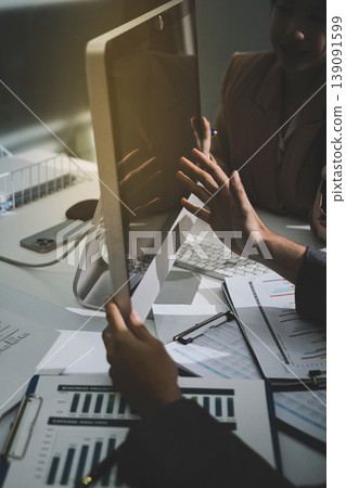 Accounting company provide finance and taxation planning for profitable cash flow, Auditor accountant working in office, analyze financial data and accounting record with calculator Accounting company provide finance and taxation planning for profitable cash flow, Auditor accountant working in office, analyze financial data and accounting record with calculator 139091599