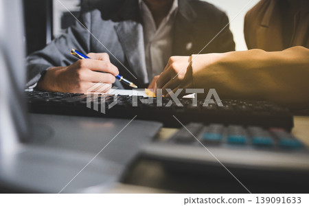 Accounting company provide finance and taxation planning for profitable cash flow, Auditor accountant working in office, analyze financial data and accounting record with calculator Accounting company provide finance and taxation planning for profitable cash flow, Auditor accountant working in office, analyze financial data and accounting record with calculator 139091633