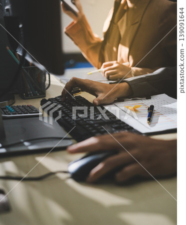 Accounting company provide finance and taxation planning for profitable cash flow, Auditor accountant working in office, analyze financial data and accounting record with calculator Accounting company provide finance and taxation planning for profitable cash flow, Auditor accountant working in office, analyze financial data and accounting record with calculator 139091644