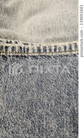 Close-up of blue stonewashed jeans Close-up of blue stonewashed jeans 139091681