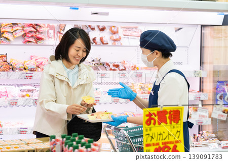 People working at a supermarket - sample corner People working at a supermarket - sample corner 139091783
