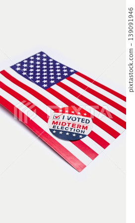 A Vertical View Of The American Flag With Midterm Elections Sticker , On A White Background 139091946