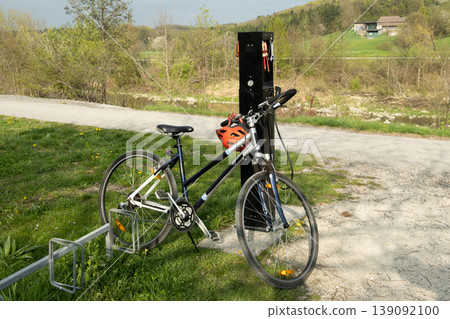 Public bicycle repair station on a scenic bike path. Public bicycle repair station on a scenic bike path. 139092100