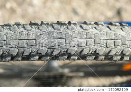 Detailed texture of damaged bicycle rubber tire. Detailed texture of damaged bicycle rubber tire. 139092109
