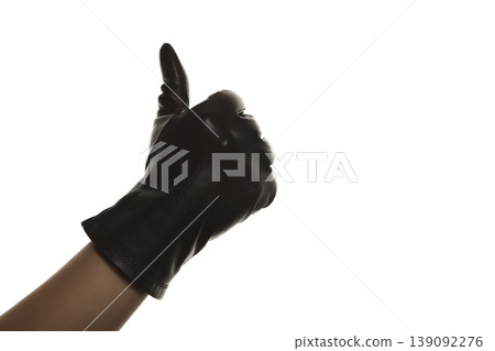 Close Up of Female Hand in Leather Glove Studio Shot. Close Up of Female Hand in Leather Glove Studio Shot. 139092276