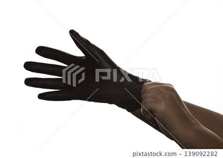 Female Hand Wearing Leather Glove Gesture on White Background. Female Hand Wearing Leather Glove Gesture on White Background. 139092282