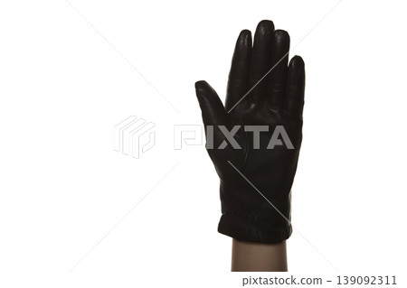 Close Up of Female Hand in Leather Glove Studio Shot. 139092311