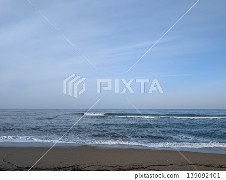 Blue sky and calm ocean horizon; simple ocean background with copy space. 139092401