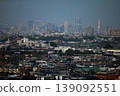 The Odakyu Romancecar runs with the Tokyo city center at night as its backdrop. 139092551