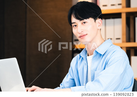 Businessman using a personal computer Businessman using a personal computer 139092823