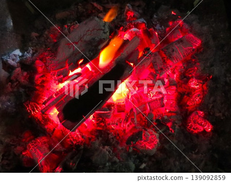 Embers from a bonfire Embers from a bonfire 139092859