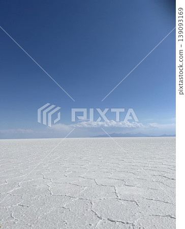 The Salar de Uyuni in Bolivia: A landscape of vast stretches of salt-covered land. The Salar de Uyuni in Bolivia: A landscape of vast stretches of salt-covered land. 139093169