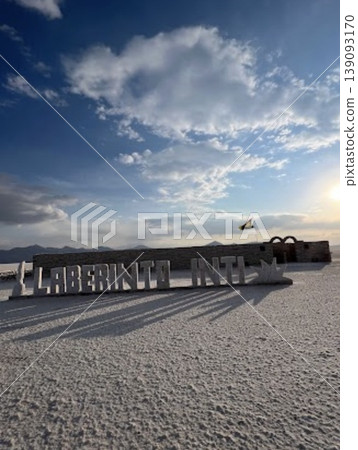 A sunset view of the salt flats in Uyuni, Bolivia, where salt blocks are being made. A sunset view of the salt flats in Uyuni, Bolivia, where salt blocks are being made. 139093170