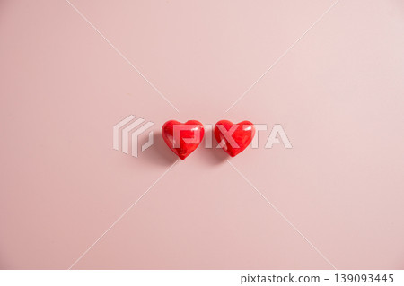 Valentine Day background with red hearts over pink background. St. Valentine's Day love concept, flat lay with copy space Valentine Day background with red hearts over pink background. St. Valentine's Day love concept, flat lay with copy space 139093445