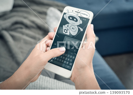 AI chatbot loading on smartphone, virtual assistant hologram, artificial intelligence processing concept AI chatbot loading on smartphone, virtual assistant hologram, artificial intelligence processing concept 139093570