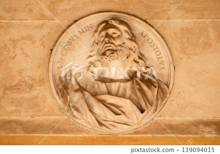 Saint James the Apostle, bass relief in portico of church dei Santi XII Apostoli in Rome, Italy Saint James the Apostle, bass relief in portico of church dei Santi XII Apostoli in Rome, Italy 139094015