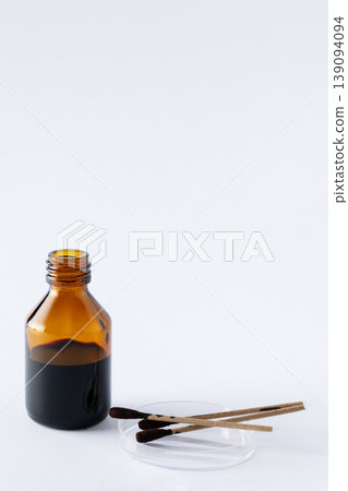 Pharmaceutical bottle of iodine on white background. Healthcare, antiseptic treatment, and hygiene concept. Pharmaceutical bottle of iodine on white background. Healthcare, antiseptic treatment, and hygiene concept. 139094094