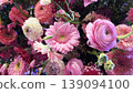 Background of mixed gerbera flowers in various colors. Bright gerbera floral composition with fresh petals and vibrant natural beauty. 139094100