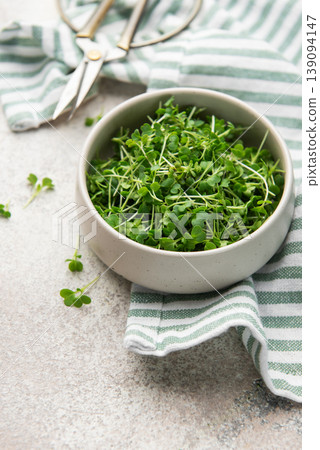 Fresh microgreens in bowl promoting healthy eating Fresh microgreens in bowl promoting healthy eating 139094147