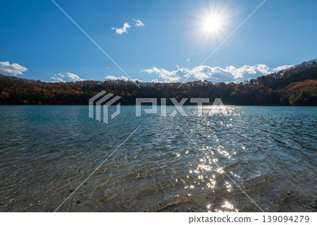 The scenery of Katanuma Lake: The cobalt blue surface of the caldera lake. 139094279