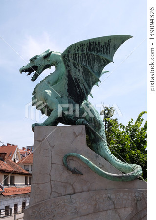 Dragon - symbol of the Slovenian capital on the Dragon Bridge in Ljubljana, Slovenia Dragon - symbol of the Slovenian capital on the Dragon Bridge in Ljubljana, Slovenia 139094326