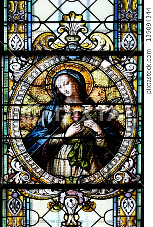 Immaculate heart of Mary, stained glass window in Cathedral of St Nicholas in Novo Mesto, Slovenia 139094344