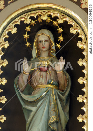 Immaculate Heart of Mary, statue on the altar of the Visitation of Mary in the church of the Saint Peter in Ivanic Grad, Croatia Immaculate Heart of Mary, statue on the altar of the Visitation of Mary in the church of the Saint Peter in Ivanic Grad, Croatia 139094936
