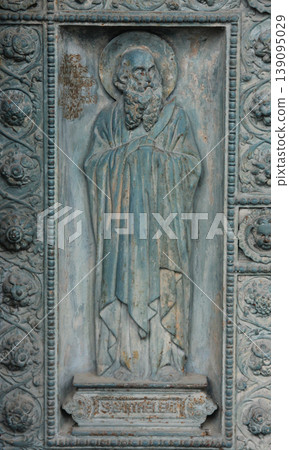 Saint Bartholomew, detail of door of Saint Vincent de Paul church, Paris 139095029